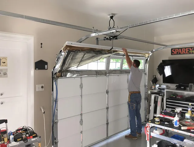 Garage door section replacement by Vernon Garage Door Repair in Vernon