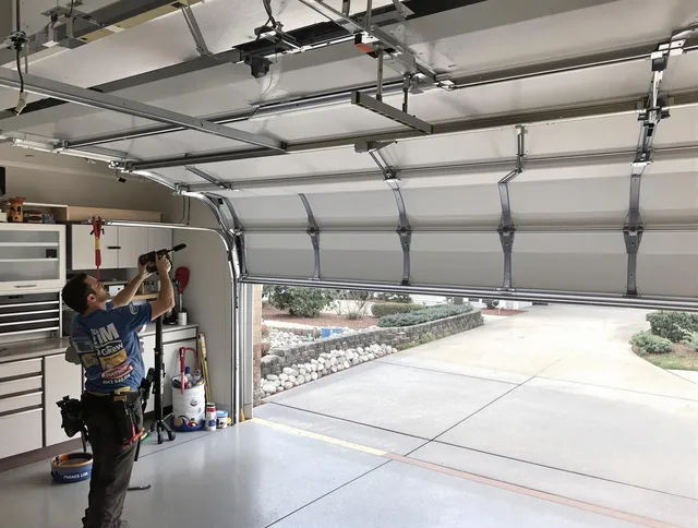 Garage door track repair service by Vernon Garage Door Repair in Vernon